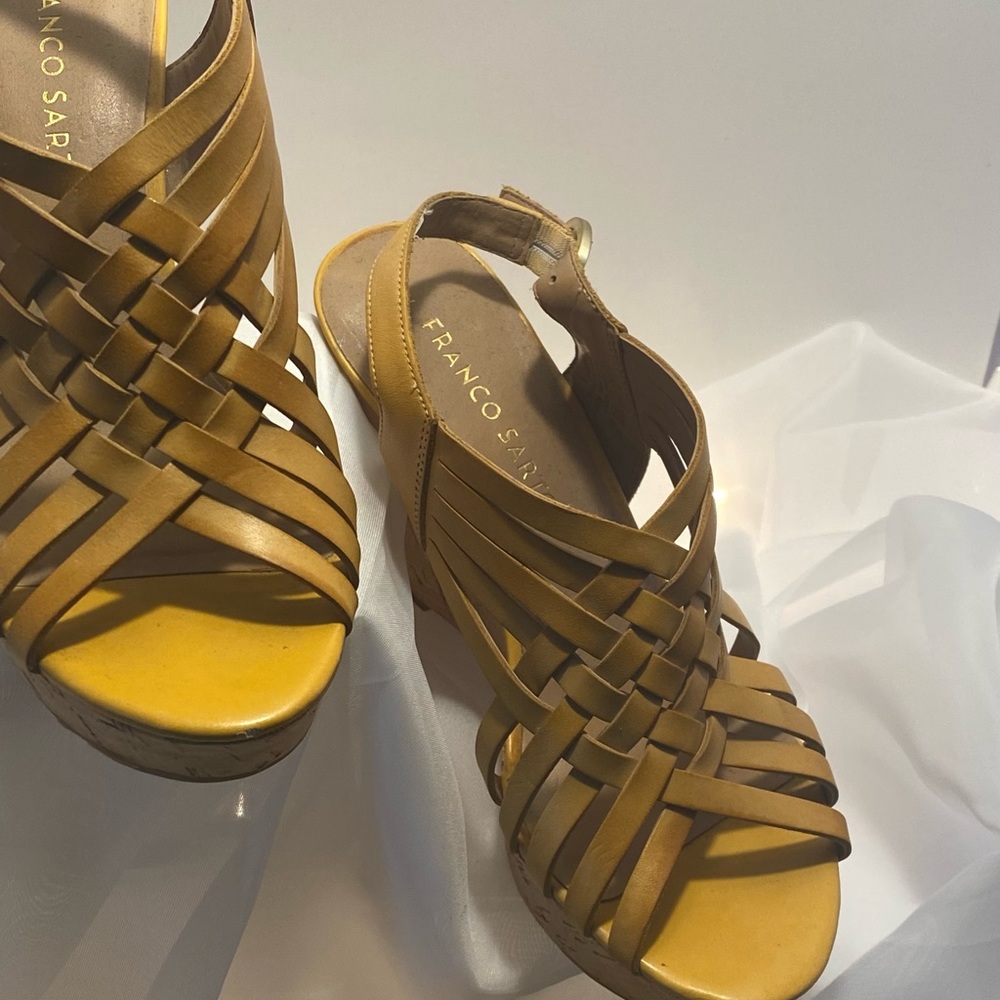 Franco Sarto platform sandals.  Light weight and never been worn. Size 7